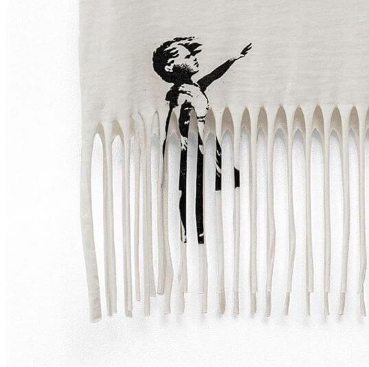 detalle camiseta banksy